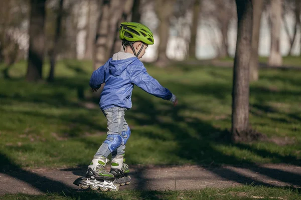 Cute Boy Park Rides Rollers Sunny Warm — Stock Photo, Image