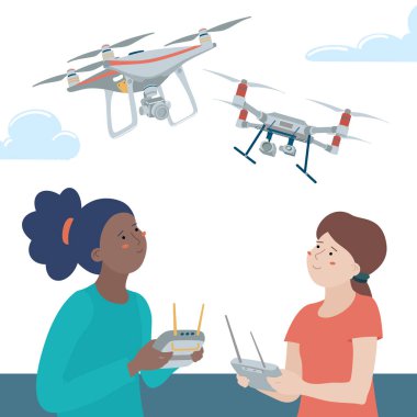 İki genç kız açık havada drones ile oynuyor