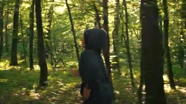 Jogging in the forest for a girl — Stock Video