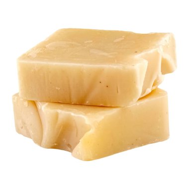 Yakın çekim görüntüsü, bir araya getirilmiş iki katı sarı sabun parçası.