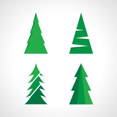 Dört yeşil Noel ağacı kümesi