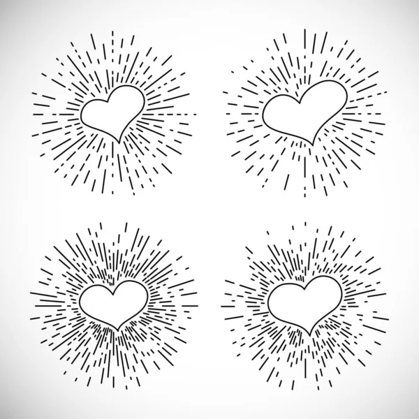 Set van vier harten met vintage barsten stralen — Stockvector