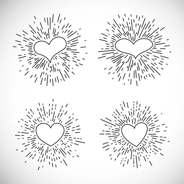 Ensemble de quatre coeurs avec des rayons éclatants vintage — Image vectorielle