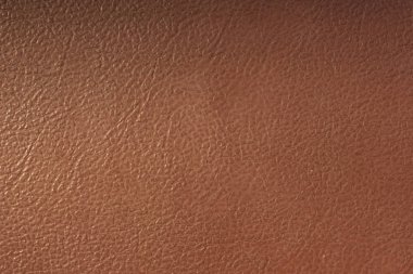 Kahverengi deri arkaplanı ya da dokuyu kapat.