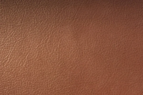 Kahverengi deri arkaplanı ya da dokuyu kapat.