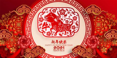 2021 yılında Çin 'de öküz, kırmızı kağıt arka planda el işi tarzıyla öküz, çiçek ve Asyalı elementleri kesiyor. (Çince çevirisi: Mutlu Çince yeni yıl 2021, öküz yılı)