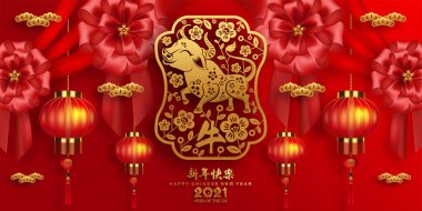 2021 yılında Çin 'de öküz, kırmızı kağıt arka planda el işi tarzıyla öküz, çiçek ve Asyalı elementleri kesiyor. (Çince çevirisi: Mutlu Çince yeni yıl 2021, öküz yılı)