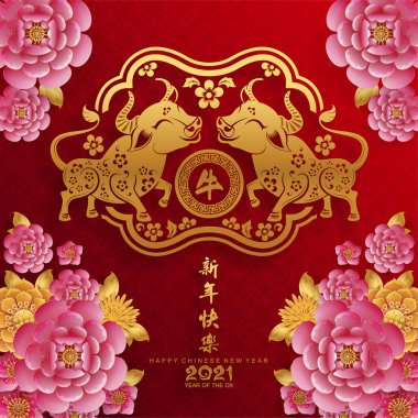 2021 yılında Çin 'de öküz, kırmızı kağıt arka planda el işi tarzıyla öküz, çiçek ve Asyalı elementleri kesiyor. (Çince çevirisi: Mutlu Çince yeni yıl 2021, öküz yılı)