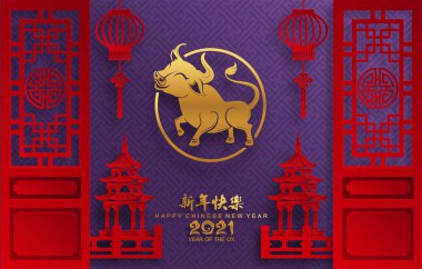 2021 yılında Çin 'de öküz, kırmızı kağıt arka planda el işi tarzıyla öküz, çiçek ve Asyalı elementleri kesiyor. (Çince çevirisi: Mutlu Çince yeni yıl 2021, öküz yılı)