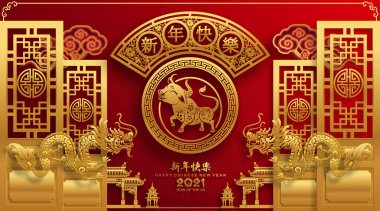 2021 yılında Çin 'de öküz, kırmızı kağıt arka planda el işi tarzıyla öküz, çiçek ve Asyalı elementleri kesiyor. (Çince çevirisi: Mutlu Çince yeni yıl 2021, öküz yılı)