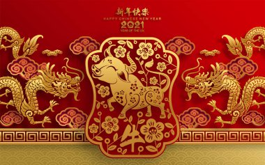 2021 yılında Çin 'de öküz, kırmızı kağıt arka planda el işi tarzıyla öküz, çiçek ve Asyalı elementleri kesiyor. (Çince çevirisi: Mutlu Çince yeni yıl 2021, öküz yılı)