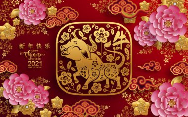 2021 yılında Çin 'de öküz, kırmızı kağıt arka planda el işi tarzıyla öküz, çiçek ve Asyalı elementleri kesiyor. (Çince çevirisi: Mutlu Çince yeni yıl 2021, öküz yılı)