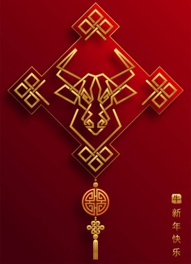 2021 yılında Çin 'de öküz, kırmızı kağıt arka planda el işi tarzıyla öküz, çiçek ve Asyalı elementleri kesiyor. (Çince çevirisi: Mutlu Çince yeni yıl 2021, öküz yılı)