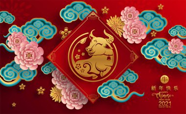 2021 yılında Çin 'de öküz, kırmızı kağıt arka planda el işi tarzıyla öküz, çiçek ve Asyalı elementleri kesiyor. (Çince çevirisi: Mutlu Çince yeni yıl 2021, öküz yılı)
