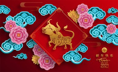 2021 yılında Çin 'de öküz, kırmızı kağıt arka planda el işi tarzıyla öküz, çiçek ve Asyalı elementleri kesiyor. (Çince çevirisi: Mutlu Çince yeni yıl 2021, öküz yılı)