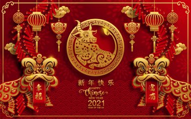 2021 yılında Çin 'de öküz, kırmızı kağıt arka planda el işi tarzıyla öküz, çiçek ve Asyalı elementleri kesiyor. (Çince çevirisi: Mutlu Çince yeni yıl 2021, öküz yılı)