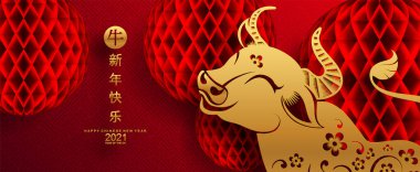 2021 yılında Çin 'de öküz, kırmızı kağıt arka planda el işi tarzıyla öküz, çiçek ve Asyalı elementleri kesiyor. (Çince çevirisi: Mutlu Çince yeni yıl 2021, öküz yılı)