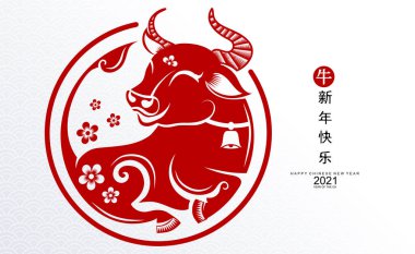 2021 yılında Çin 'de öküz, kırmızı kağıt arka planda el işi tarzıyla öküz, çiçek ve Asyalı elementleri kesiyor. (Çince çevirisi: Mutlu Çince yeni yıl 2021, öküz yılı)
