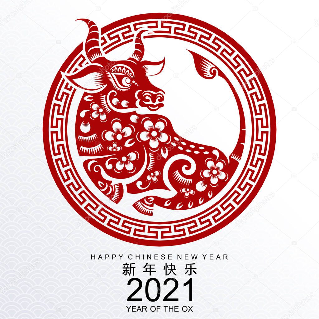 Chinese new year 2021 year of the ox , red paper cut ox character,flower and asian elements with craft style on background.(Chinese translation : Happy chinese new year 2021, year of ox)