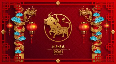 2021 yılında Çin 'de öküz, kırmızı kağıt arka planda el işi tarzıyla öküz, çiçek ve Asyalı elementleri kesiyor. (Çince çevirisi: Mutlu Çince yeni yıl 2021, öküz yılı)