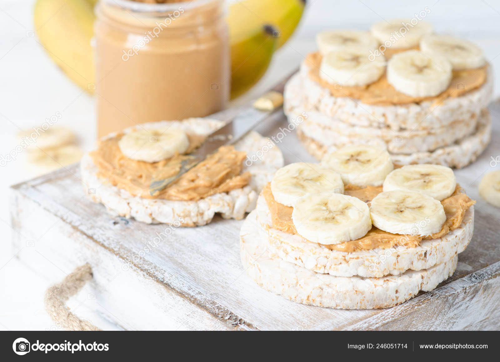 Healthy Breakfast Rice Cakes Peanut Butter Slices Banana White Wooden Stock Photo by