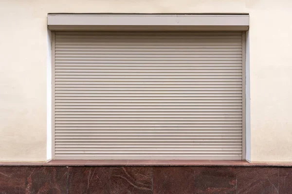 Window closed roll shutters without pattern — Stock Photo, Image