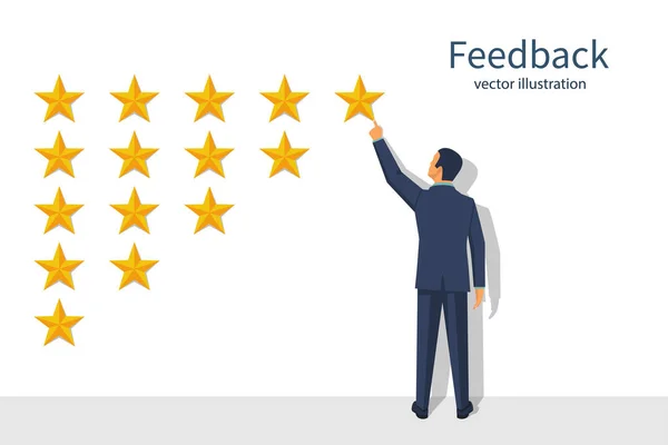 Star Rating. Altın yıldız elinde, fi vermek tutan işadamı — Stok Vektör