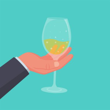 Elinde içki olan bir şarap kadehi. Alkolik içecekler.