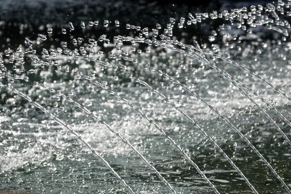 Water flow treatment system from the water pump pipe.Motion of water gushing out of the pipe from Koi Pond Carp fish farm for oxygen.Water was drain by tube pvc.Industrial wastewater treatment.