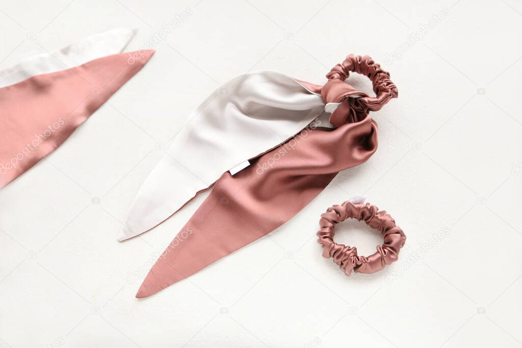 Coral-Pink hair accessories with textile rose. silk Pink Scrunchy isolated on white backdrop. Flat lay Hairdressing tools and accessories for woman - Colorful Hair Scrunchies, Textiled Elastic HairBands