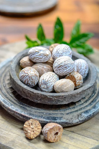 Old Clay Bowl Whole Nutmegs Close Spices Collection — Stock Photo, Image