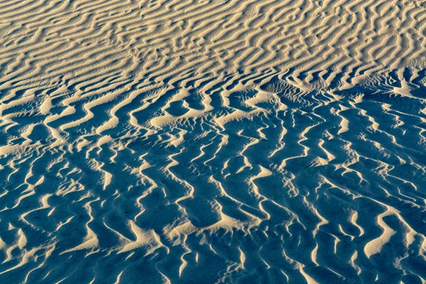 砂の砂丘波のテクスチャと背景 閉じる コピースペース — ストック写真