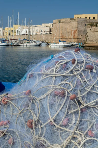 Morning landscape photo made in Gallipoli pier, colorful fishermen net after fishing, Apulia, Italy — Stock Image Morning Landscape Photo Made Gallipoli Pier Colorful Fishermen Net Fishing Royalty Free Stock Photos