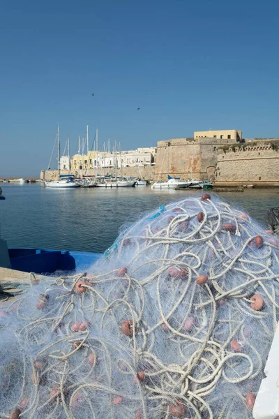Morning landscape photo made in Gallipoli pier, colorful fishermen net after fishing, Apulia, Italy — Stock Image Morning Landscape Photo Made Gallipoli Pier Colorful Fishermen Net Fishing Royalty Free Stock Photos