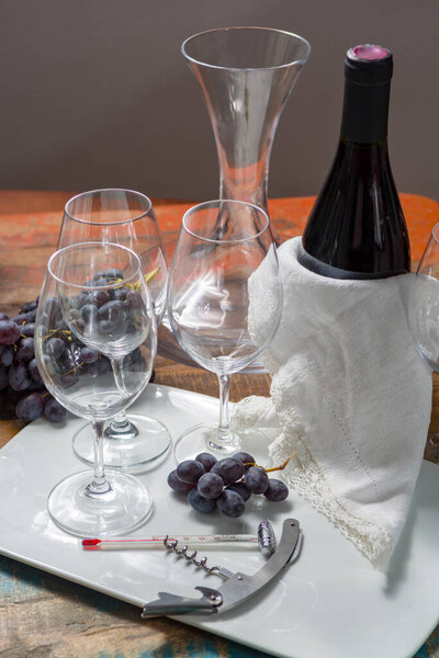 Professional red wine tasting event with high quality wine glasses and wine accessories close up