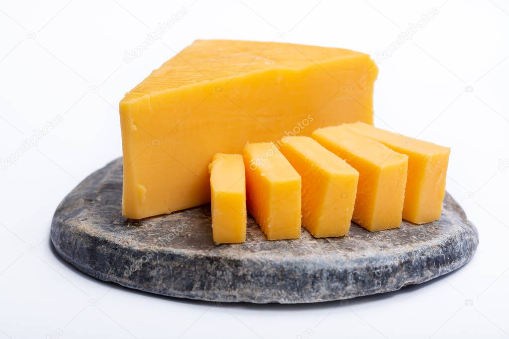 Cheddar cheese collection, piece of yellow Cheddar cheese made from cow milk close up, isolated