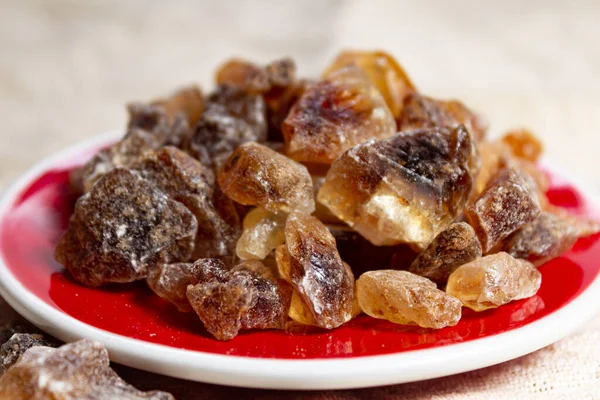 Crystals of candy sugar, traditional brown rock sugar originally from Isfachan, Iran close up