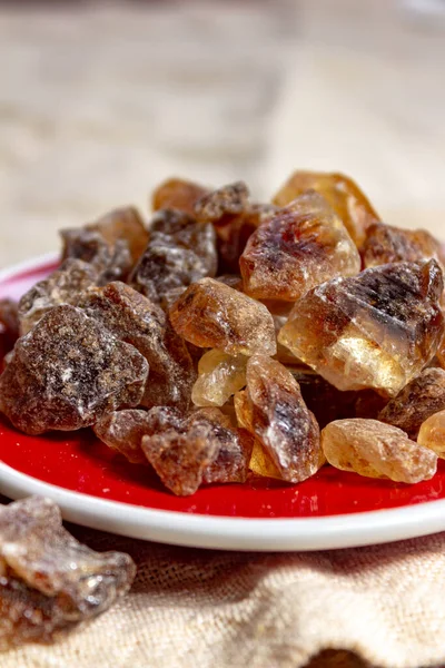 Crystals of candy sugar, traditional brown rock sugar originally from Isfachan, Iran close up