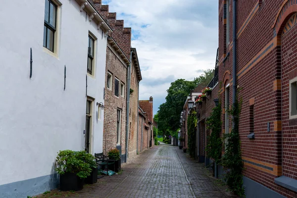 Old Dutch houses in little ancient town with big history Buren, Gelderland, Netherlands