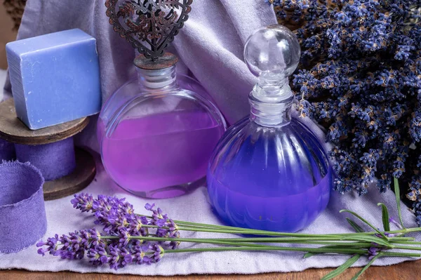 Handmade organic skincare products made from purple aromatic lavender flowers in Provence, France close up