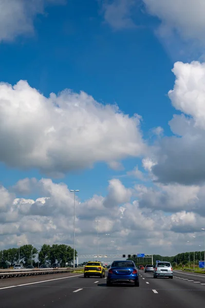 Road network infractrusture in Netherlands, driving safe on high quality asphalt on Dutch highways and briges.