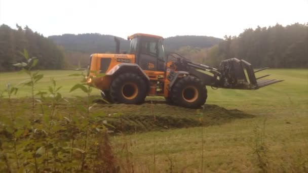 Tractor Ramming Silage Pit — Stock Video