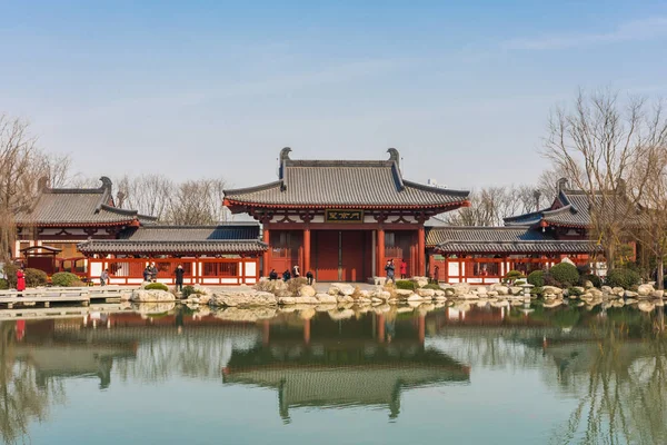 HUAQING, CHINA, 25 DECEMBER 2017: Landscape of a lake and a traditional chinese temple in Huaqing Palace