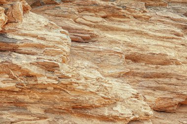 Taş dokusu. Taş gibi duvar. Granit doğal yüzey. Doku modeli. Doğal taştan yakın plan. Yapısal yüzey yakın çekim.