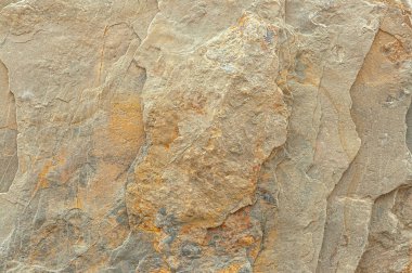 Taş dokusu. Granit doğal yüzey. Taş gibi duvar. Doku modeli. Doğal taştan yakın plan. Yapısal yüzey yakın çekim.