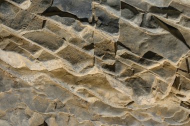 Koyu sarı granit taşın dokusu veya tasarım için arkaplan