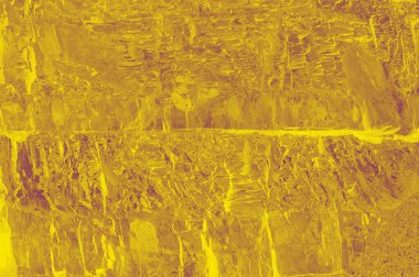 Taşların ya da dokuların altın soyut arkaplanı ve iç mekan için eğimli görüşler. Şık altın bileşimi.