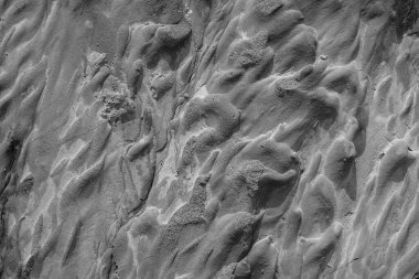 Sert bir taşın doğal arka plan dokusu ve kıç planı.