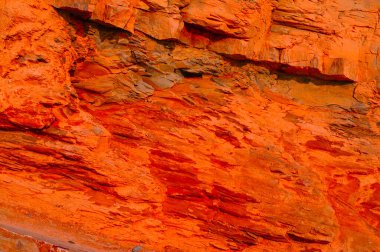 Taş zemin. Taşın dokusu yakın çekim. Taş döşemeler için tasarlanmış soyut bir arka plan. Mars 'ın taş, turuncu ve desen yüzeyine yakın çekim.