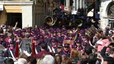 CORFU, GREECE - APRIL 7, 2018: Philharmonic musicians playing in Corfu Easter holiday celebrations.